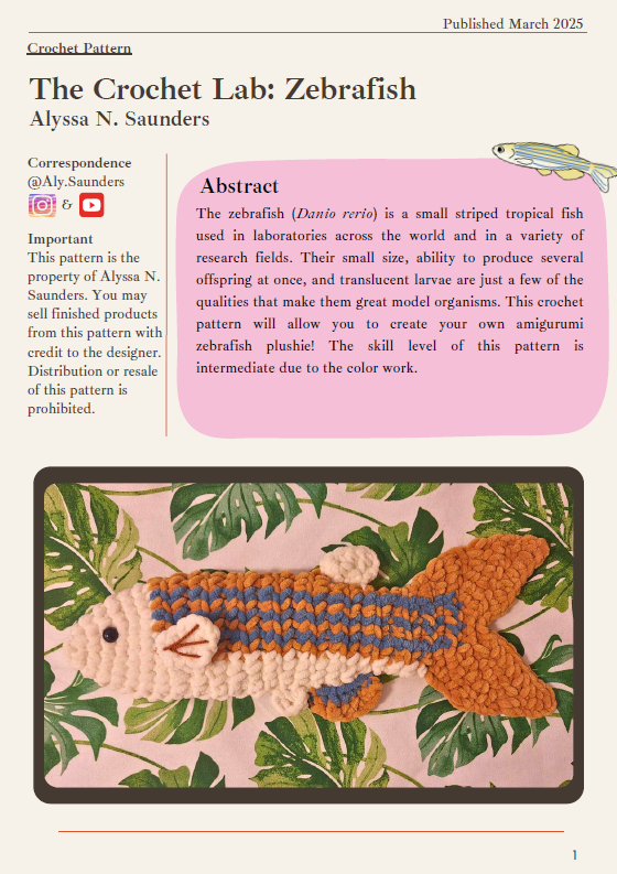 Crochet Model Organisms Cover page of a crochet pattern titled 'The Crochet Lab: Zebrafish' by Alyssa N. Saunders, featuring an abstract and a photo of a crocheted zebrafish plush on a leafy background.