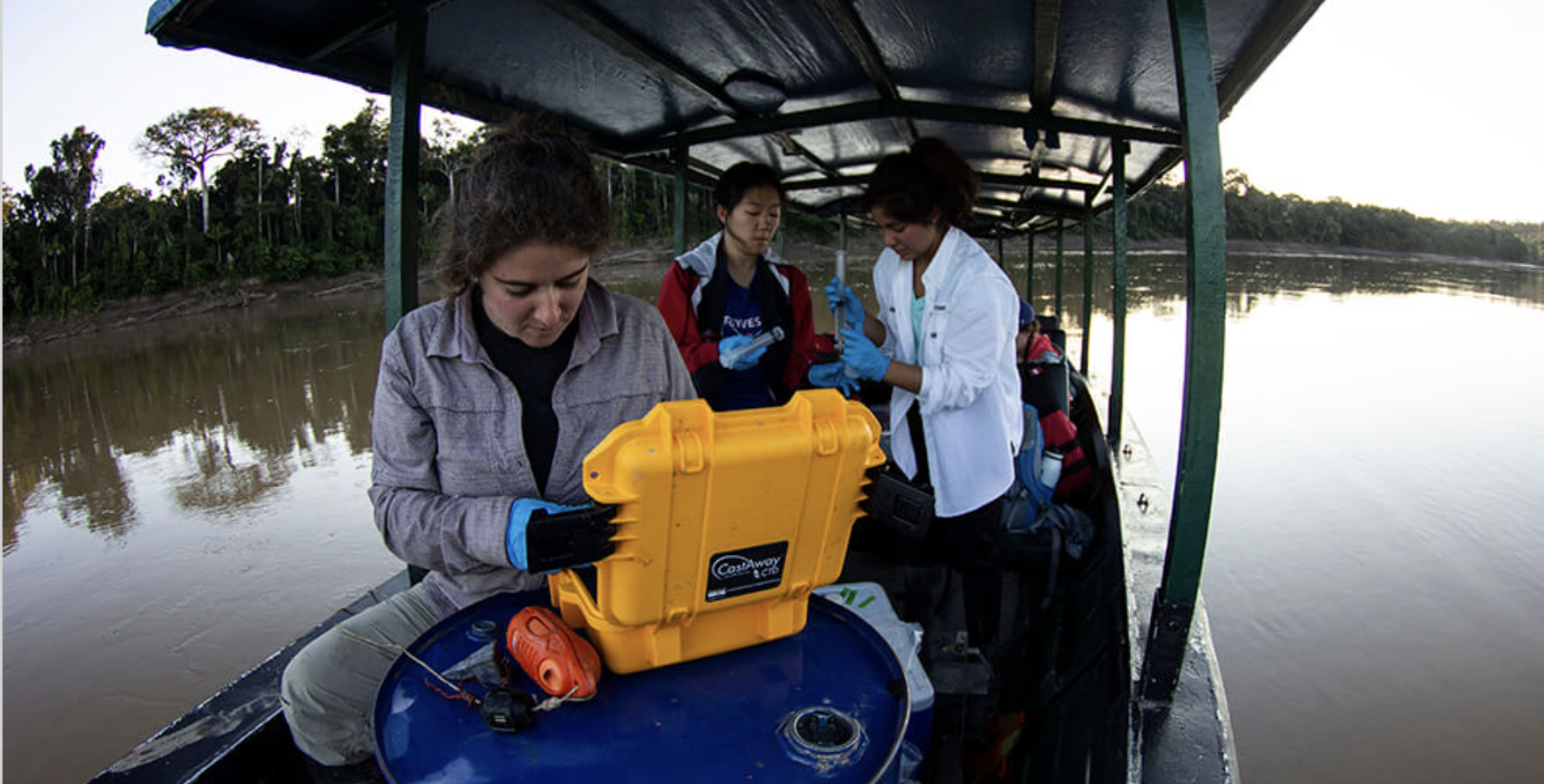 Jackie Gerson working with monitoring equipment on a boat